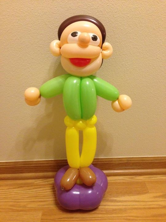 Man or boy made of balloons.