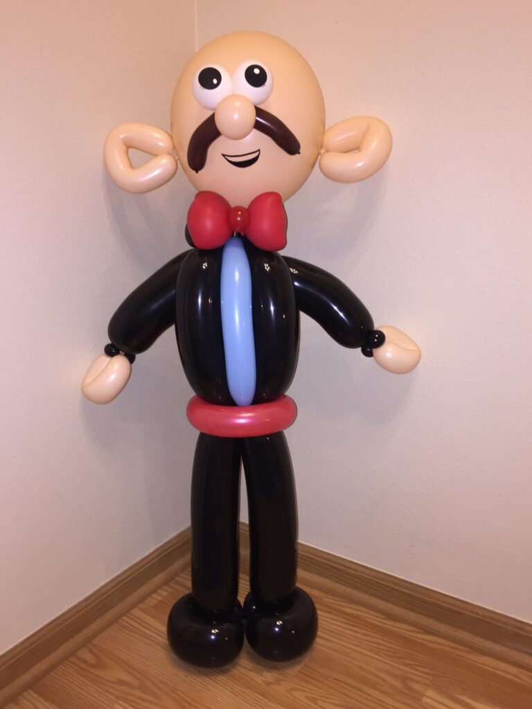 Man in tux made out of balloons
